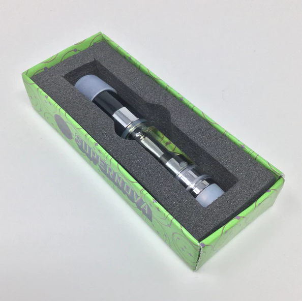 A vape pen in a green box with foam padding and the word 'SUPERNOVA' on the side.