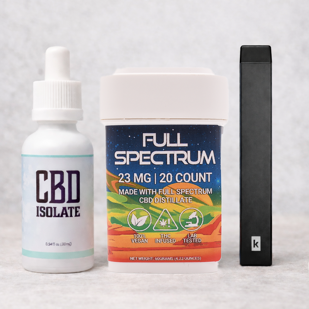 A CBD isolate dropper bottle, a Full Spectrum jar, and a sleek black vape pen.