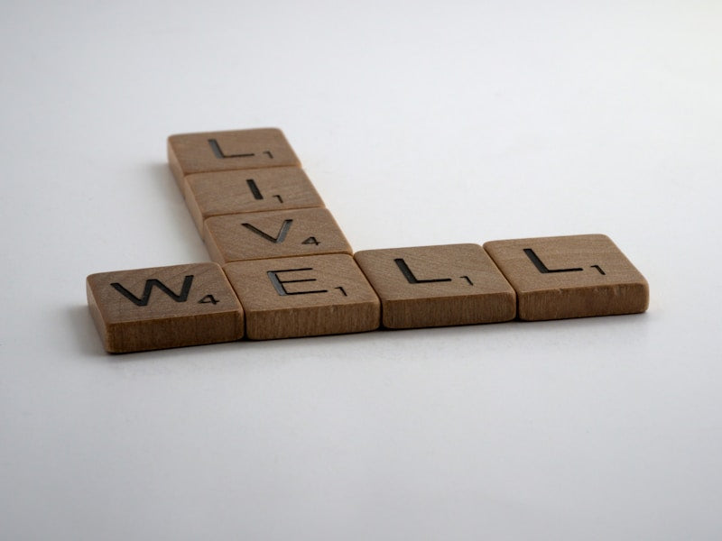 Live Well Spelled Out In Scrabble Blocks